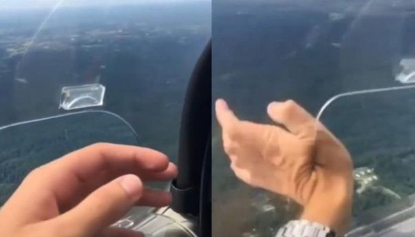 Pengguna TikTok Nekat Keluarkan Tangan dari Jendela Pesawat Ketika Terbang di Udara