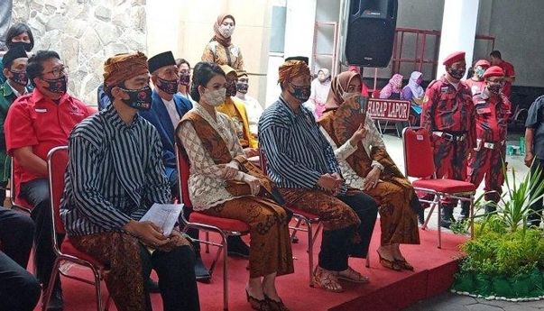 Pakai Surjan dan Diringi Gending Jawa, Gibran-Teguh Bersepeda Daftar ke KPU Solo