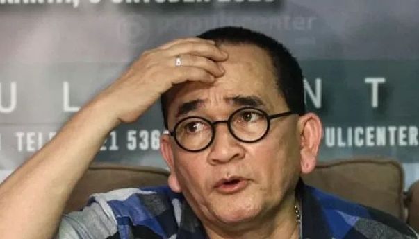 Ruhut Sitompul Resmi Dilaporkan ke Polisi usai Unggah Meme Anies Pakai Baju Adat Papua