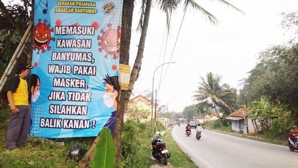 Berita Jateng: Pelanggar Aturan Masker dari Luar Daerah, Banner Dipasang di Perbatasan Kabupaten Banyumas