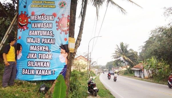 Berita Jateng: Pelanggar Aturan Masker dari Luar Daerah, Banner Dipasang di Perbatasan Kabupaten Banyumas