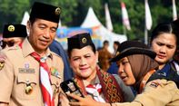 Berseragam Pramuka Lengkap, Jokowi dan Iriana Tinjau Raimuna Nasional XII